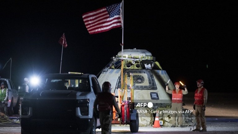 Boeing's beleaguered Starliner returns home without astronauts